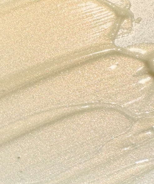 Close-up of Belif Super Drops Niacinamide Vitamin C Glow Serum texture with gold pearls and niacinamide to blur imperfections and boost radiance