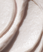 Close-up of The Face Shop Rice Water Bright Rice Bran Gentle Exfoliating Cleanser's creamy texture with fine exfoliating particles