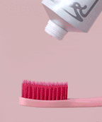 A close-up of the pink bristles of the Euthymol Whitening Toothbrush.