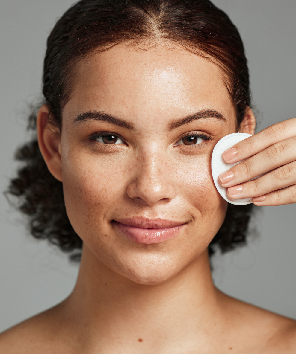 An image of a model using the Tea Tree Toner Pads.